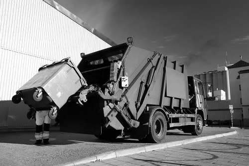 Truck and crew starting a garden clearance in Kingston streetscape